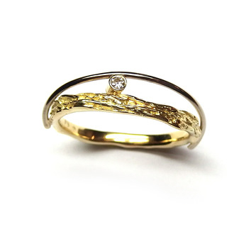 grillige ring met witgouden lijn en diamant
