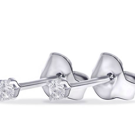  Witgouden solitaire oorstekers met diamant